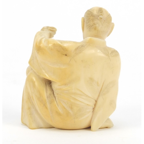 175 - Japanese carved ivory Okimono of a figure holding a basket, 6cm high