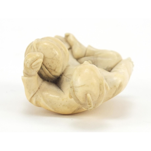 175 - Japanese carved ivory Okimono of a figure holding a basket, 6cm high