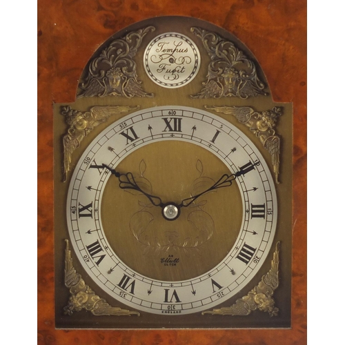 122 - Burr walnut Elliott mantle clock in the form of a bracket clock with silvered chapter ring, having R... 