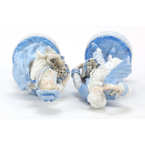 149 - Pair of 19th century Continental porcelain figures of the flower sellers, the largest 27cm high