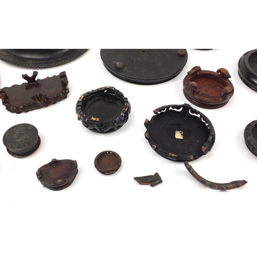 173 - Chinese carved soapstone figure of an Elder and collection of Chinese carved hardwood stands, each 3... 