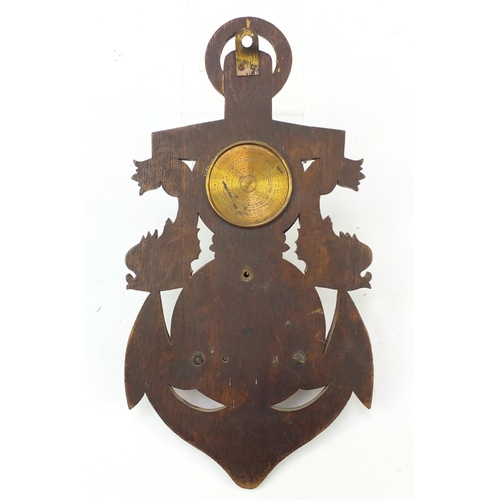 120 - Oak anchor design wall clock and barometer carved with dolphins by F Wiggins & Sons of London, 53cm ... 