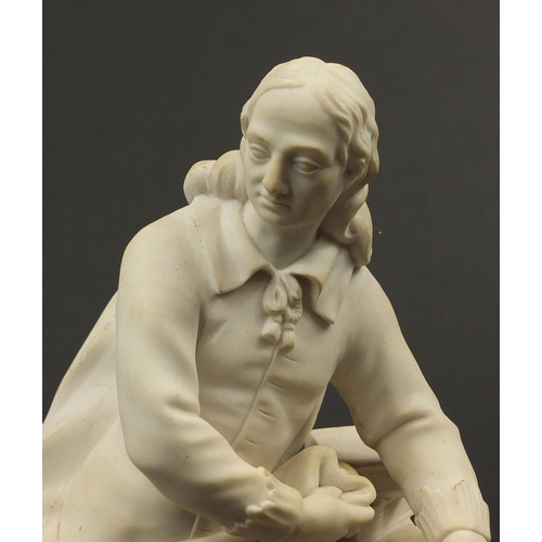 147 - Victorian parian figure of a man beside a pillar holding a scroll, 24.5cm high