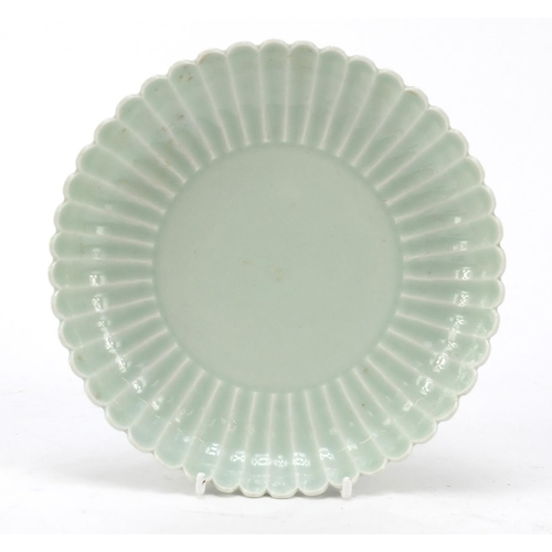 169 - Good Chinese porcelain shallow flower head dish having a celadon glaze, six figure Qianlong characte... 
