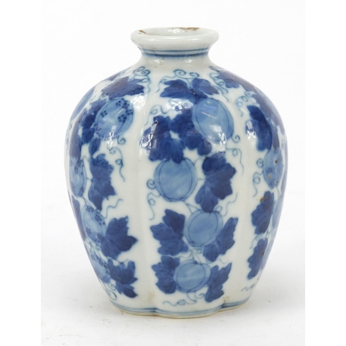 164 - Chinese blue and white porcelain vase hand painted with fruit and leaves, four figure character mark... 