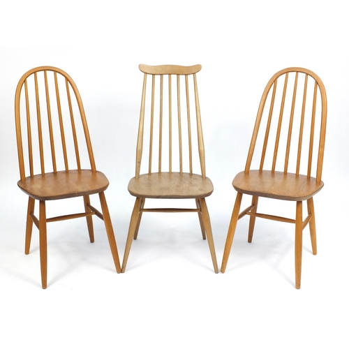 858A - Three Ercol style dining chairs, the largest, 99cm high
