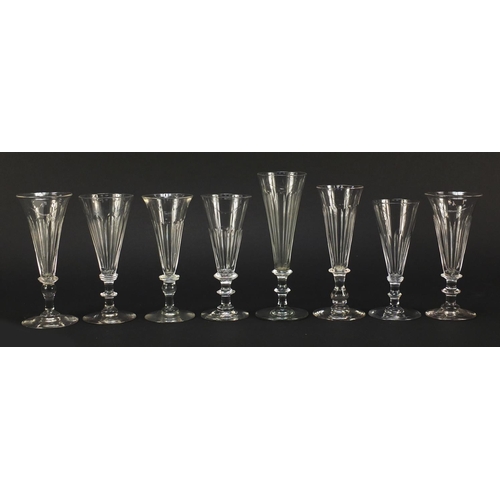 140 - Eight 18th/19th century Champagne flutes with blade collars and knopped stems, the largest 15.5cm hi... 
