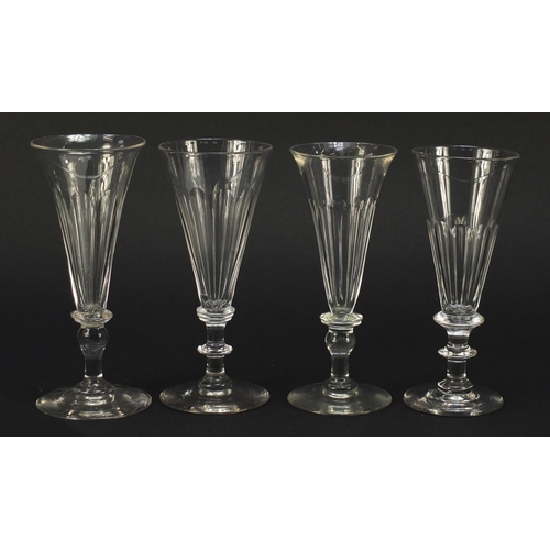 140 - Eight 18th/19th century Champagne flutes with blade collars and knopped stems, the largest 15.5cm hi... 