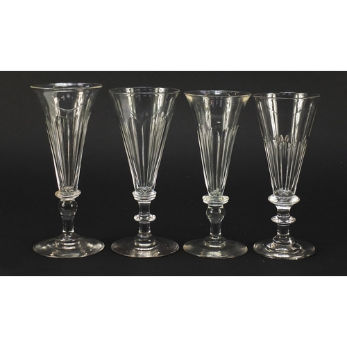 140 - Eight 18th/19th century Champagne flutes with blade collars and knopped stems, the largest 15.5cm hi... 