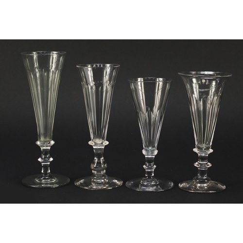 140 - Eight 18th/19th century Champagne flutes with blade collars and knopped stems, the largest 15.5cm hi... 