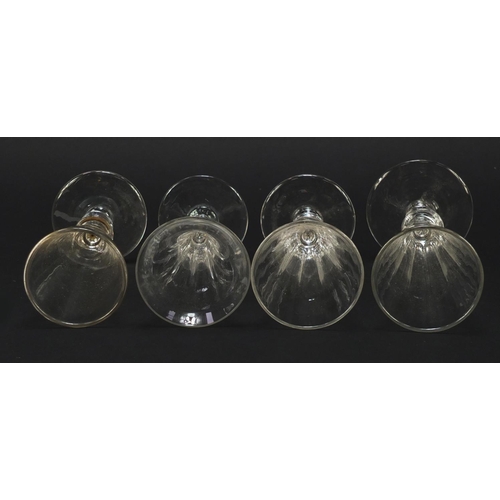141 - Eight 18th/19th century Champagne flutes with blade collars and knopped stems, the largest 18cm high