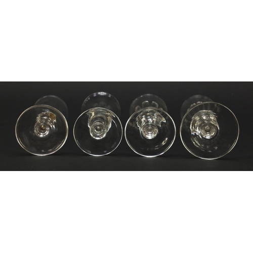 141 - Eight 18th/19th century Champagne flutes with blade collars and knopped stems, the largest 18cm high