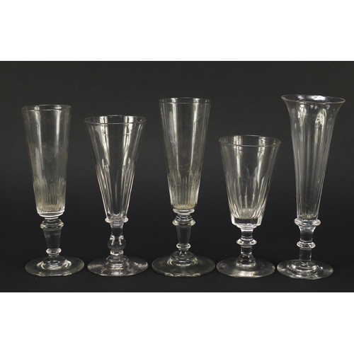 143 - Ten 18th/19th century Champagne flutes including examples with faceted knopped stems and blade colla... 