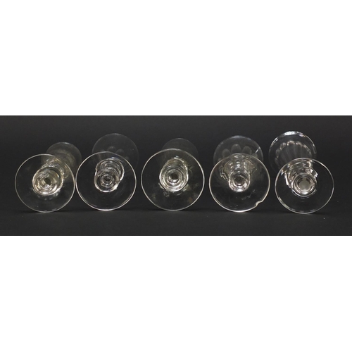 143 - Ten 18th/19th century Champagne flutes including examples with faceted knopped stems and blade colla... 