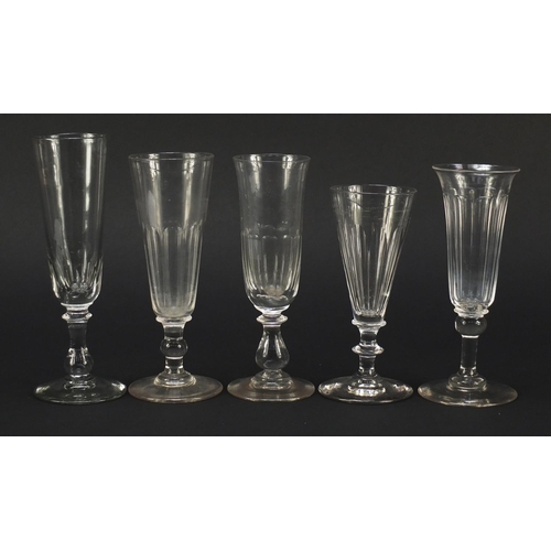 143 - Ten 18th/19th century Champagne flutes including examples with faceted knopped stems and blade colla... 
