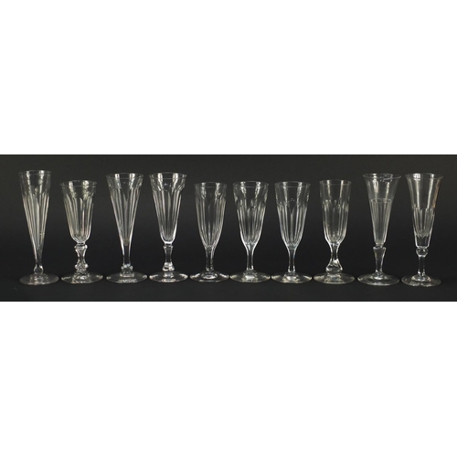 142 - Ten 18th/19th century faceted Champagne flutes, the largest 18.5cm high