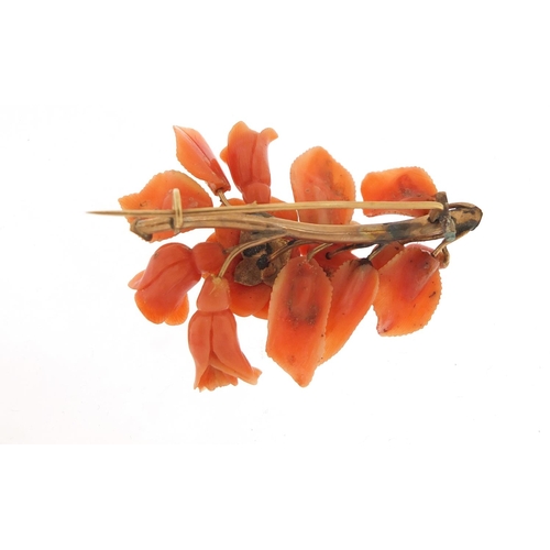 150 - Victorian unmarked gold and coral brooch, carved with a bee in flowers, (tests as 12ct gold) 6cm in ... 