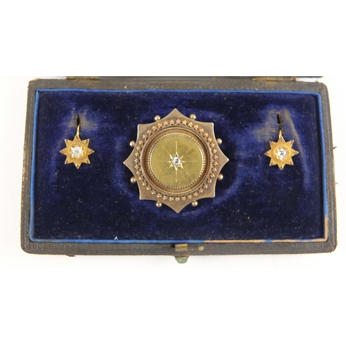69 - Victorian 15ct gold brooch and earrings, set with diamonds, housed in a W Sawdon fitted case, the br... 