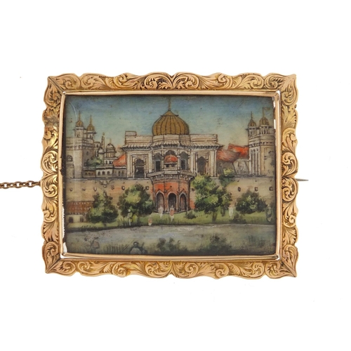 23 - Unmarked gold brooch, hand painted with a view of an Indian Mughal view of a palace, 4.5cm x 3.5cm, ... 