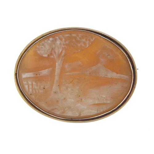 151 - Cameo brooch depicting Mount Fuji? with gilt metal mount, 3.5cm in length