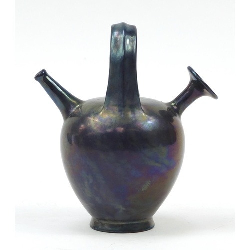 129 - Early 20th century Zsolnay Pecs pottery twin spouted ewer, painted impressed marks to the base, 19.5... 
