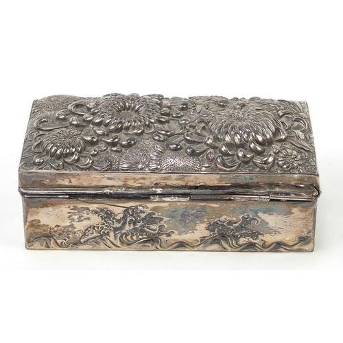 171 - Japanese silver coloured metal casket embossed with flowers, birds and waves, 17cm x 9cm x 5.2cm