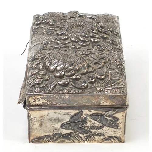 171 - Japanese silver coloured metal casket embossed with flowers, birds and waves, 17cm x 9cm x 5.2cm
