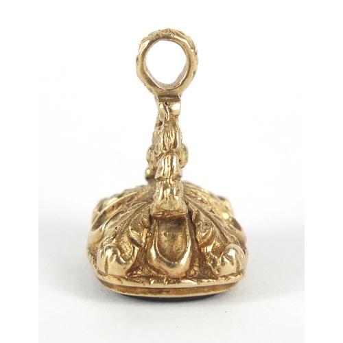 153 - Victorian unmarked gold intaglio seal fob, the bloodstone carved with a portrait of a male Roman sol... 