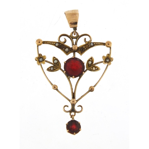 569 - Art Nouveau 9ct gold pedant set with garnets and seed pearls, 4cm in length, 1.9g