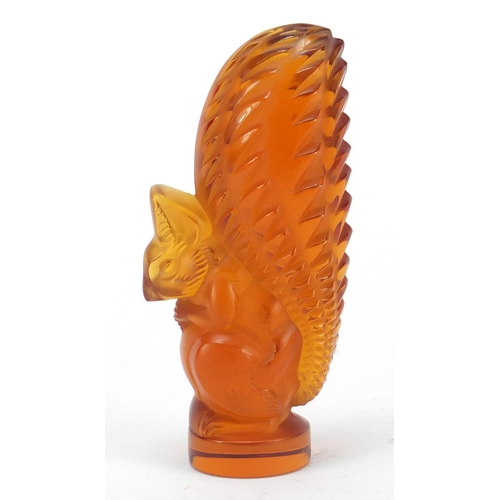 130 - Lalique amber frosted and clear glass squirrel paperweight, etched Lalique France, 11cm high