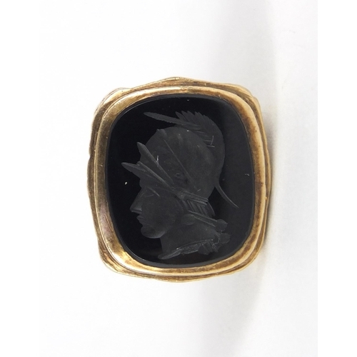 153 - Victorian unmarked gold intaglio seal fob, the bloodstone carved with a portrait of a male Roman sol... 