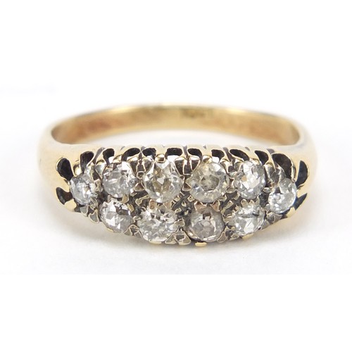70 - 18ct gold and diamond two row cluster ring, set with ten diamonds, size P, 3.9g