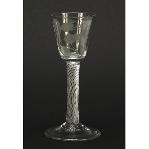 52 - 18th century Jacobite wine glass having a rounded funnel bowl engraved with a rose and foliage, on m... 