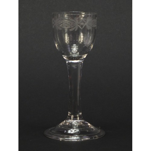 54 - 18th century wine glass with engraved bowl and folded foot, 14cm high