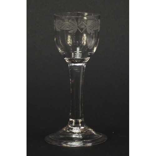 54 - 18th century wine glass with engraved bowl and folded foot, 14cm high