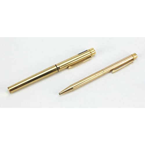 1984 - Sheaffer brass fountain pen and ballpoint pen set, with box, the fountain pen with 14K gold nib