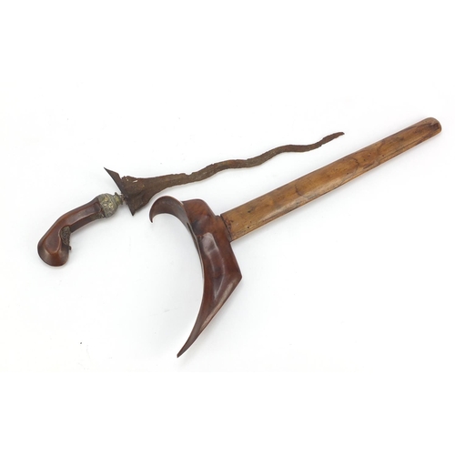 244 - Javanese Kris with carved wooden handle and sheaf, 45cm in length