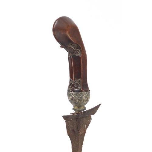 244 - Javanese Kris with carved wooden handle and sheaf, 45cm in length