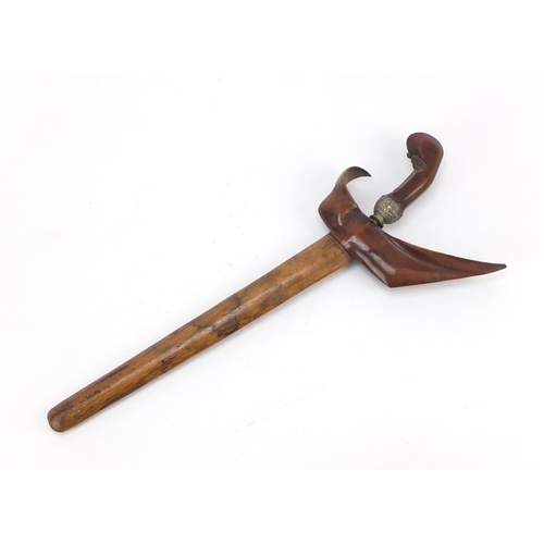 244 - Javanese Kris with carved wooden handle and sheaf, 45cm in length