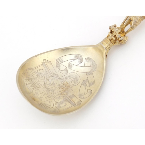 19 - Marius Hammer, Norwegian silver gilt anointing spoon with cast handle and chased bowl, impressed mar... 