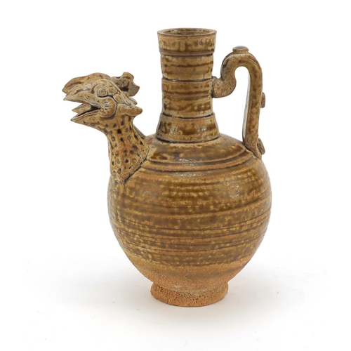 610 - Continental glazed pottery jug with twin bird head spout, possibly South American, 16cm high