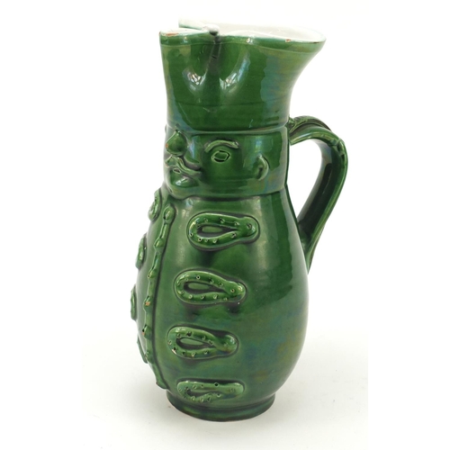 1982 - Green glazed jug modelled as a soldier, 24cm high