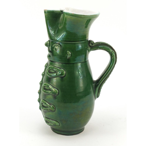 1982 - Green glazed jug modelled as a soldier, 24cm high