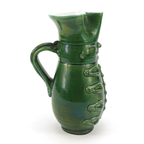 1982 - Green glazed jug modelled as a soldier, 24cm high