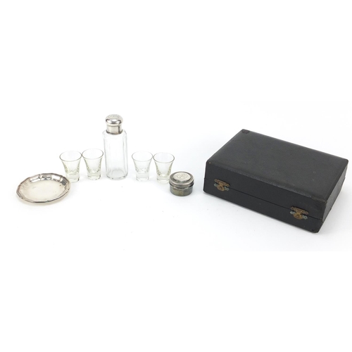 140 - Silver plated Catholic travelling communion set housed in a fitted case, the bottle 10cm high