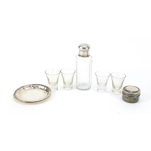 140 - Silver plated Catholic travelling communion set housed in a fitted case, the bottle 10cm high