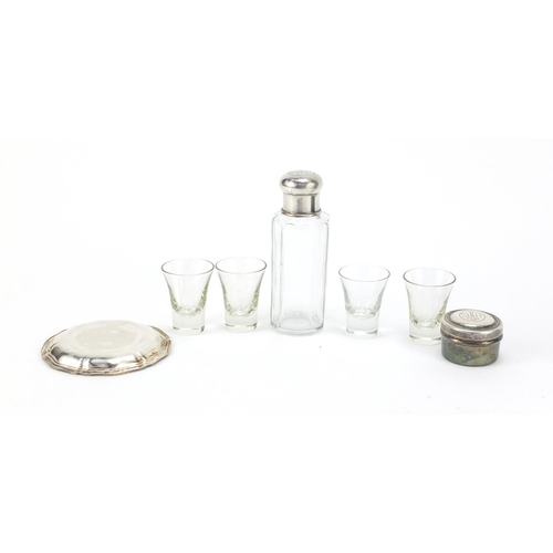 140 - Silver plated Catholic travelling communion set housed in a fitted case, the bottle 10cm high