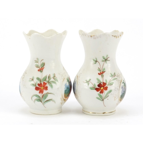 348 - Pair of Continental porcelain vases hand painted with panels of courting couples and flowers, painte... 