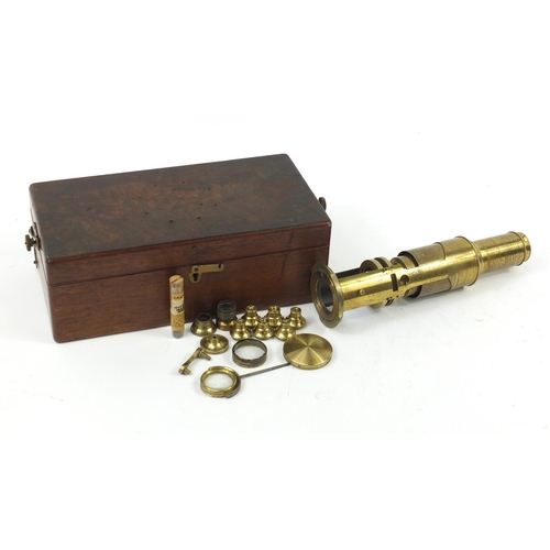 57 - Victorian brass drum microscope by Gogerty of Fleet Street London with lenses and accessories, house... 
