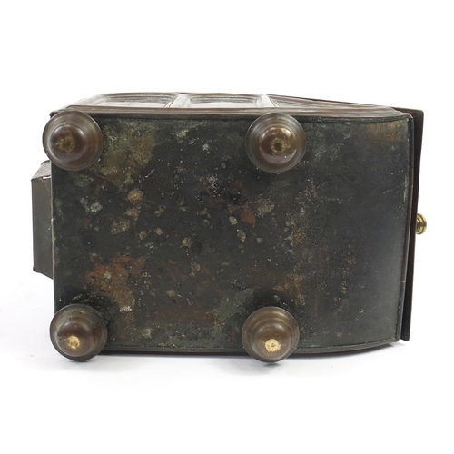 144 - Victorian aesthetic brass coal box with iron shovel, the sloping hinged front with circular floral m... 